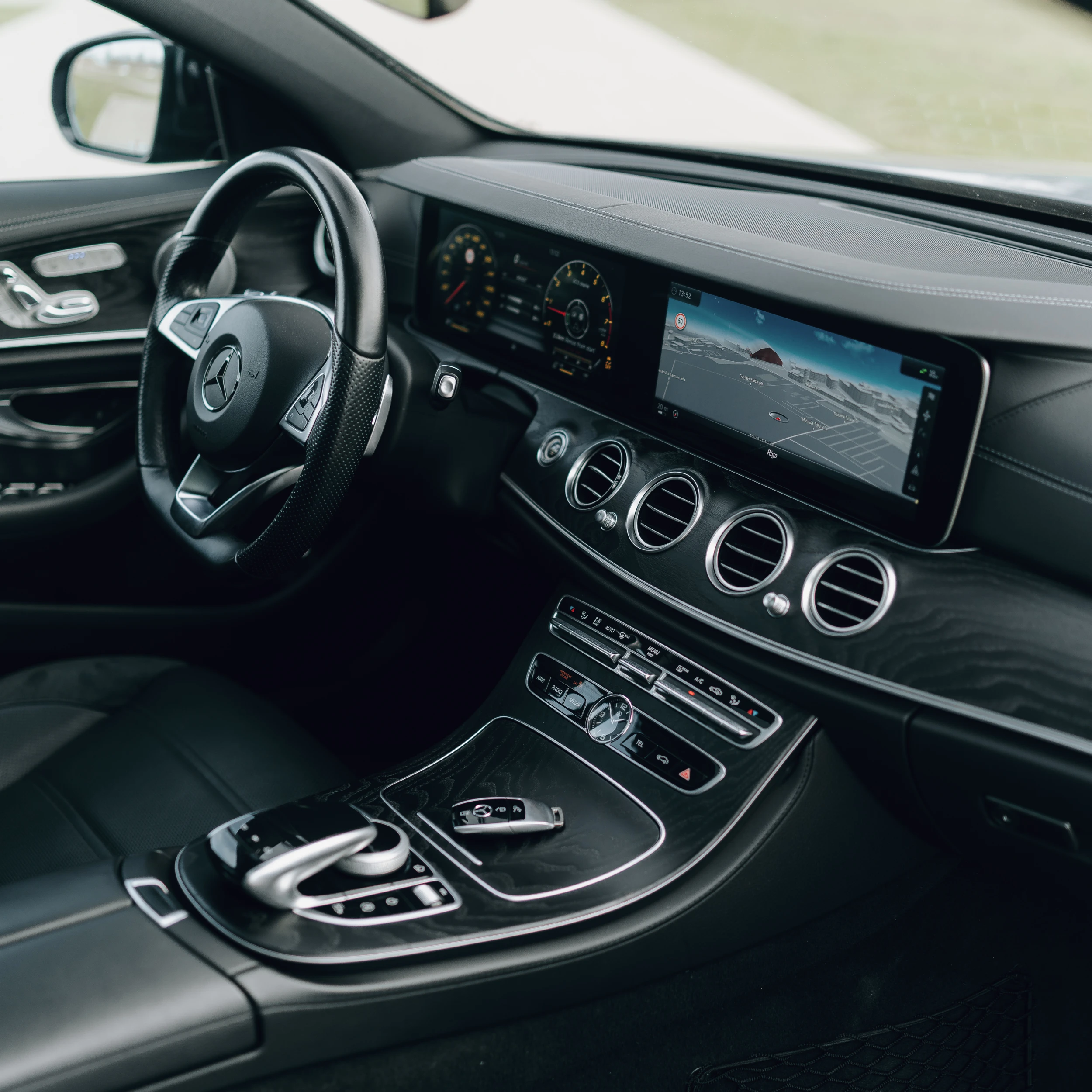 Front passenger interior of Mercedes-Benz E-Class business class vehicle