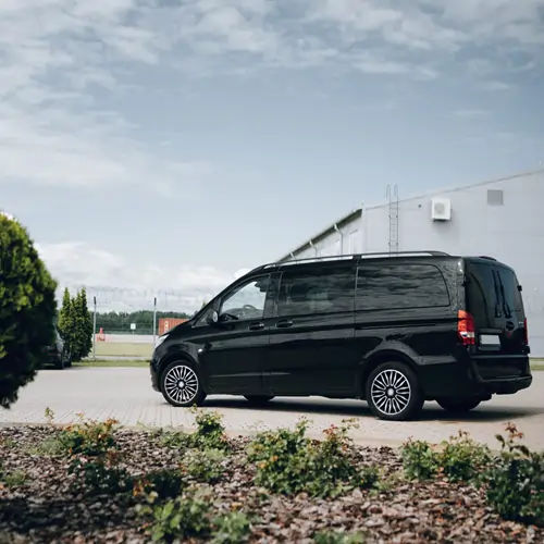 Mercedes-Benz V-Class minivan rear view ideal for airport transfers with luggage