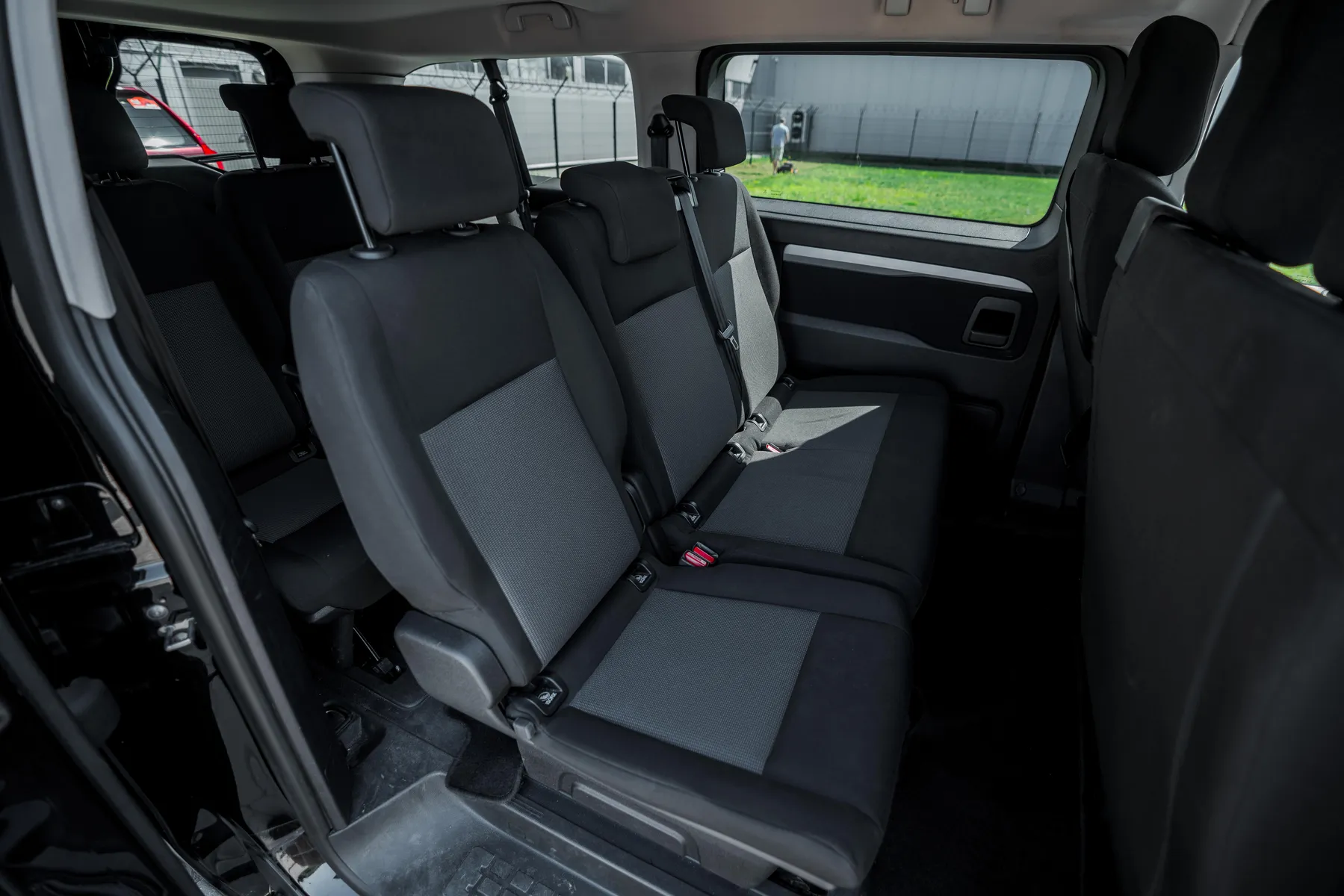 Rear passenger interior of Toyota Proace minivan with spacious seating