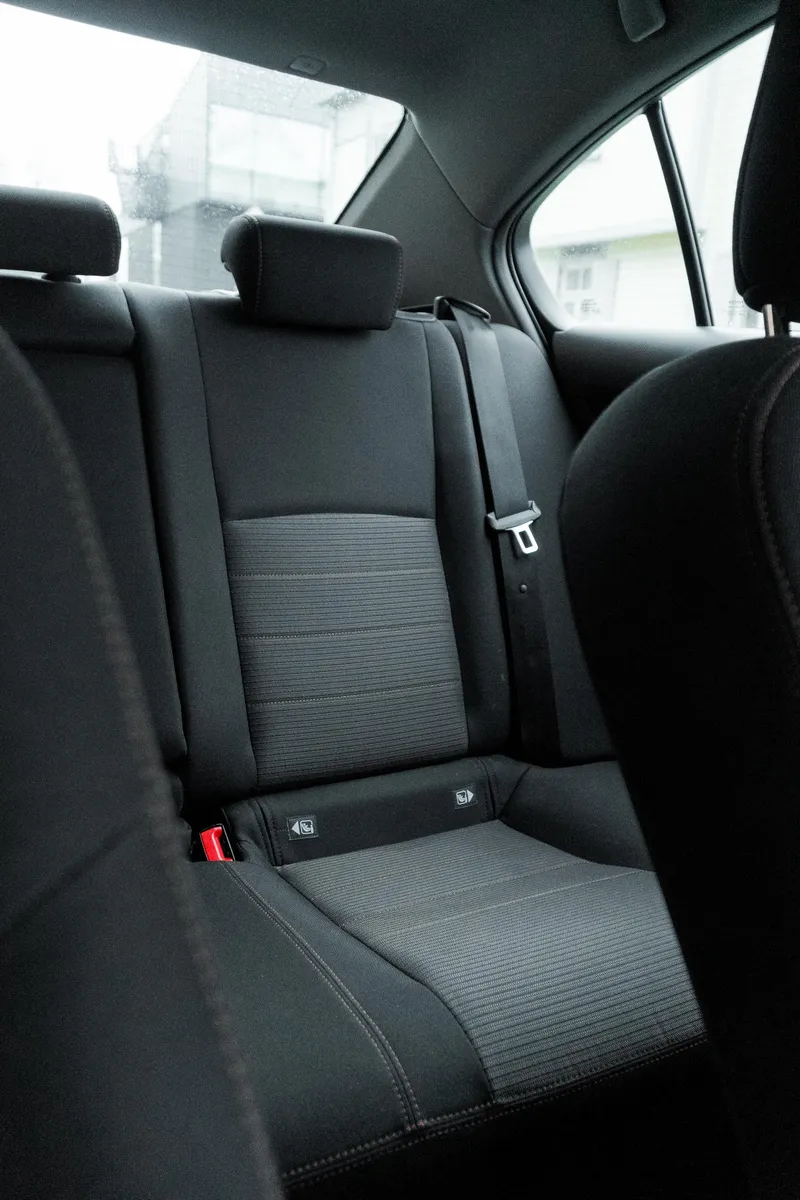 Rear passenger interior of Toyota Corolla standard class vehicle