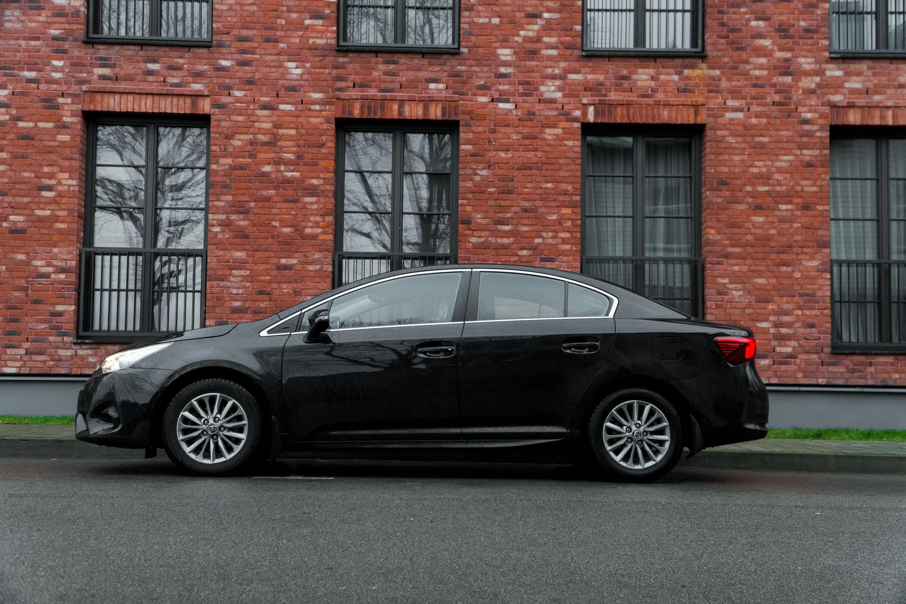 Toyota Corolla standard class car side view used for private transfers